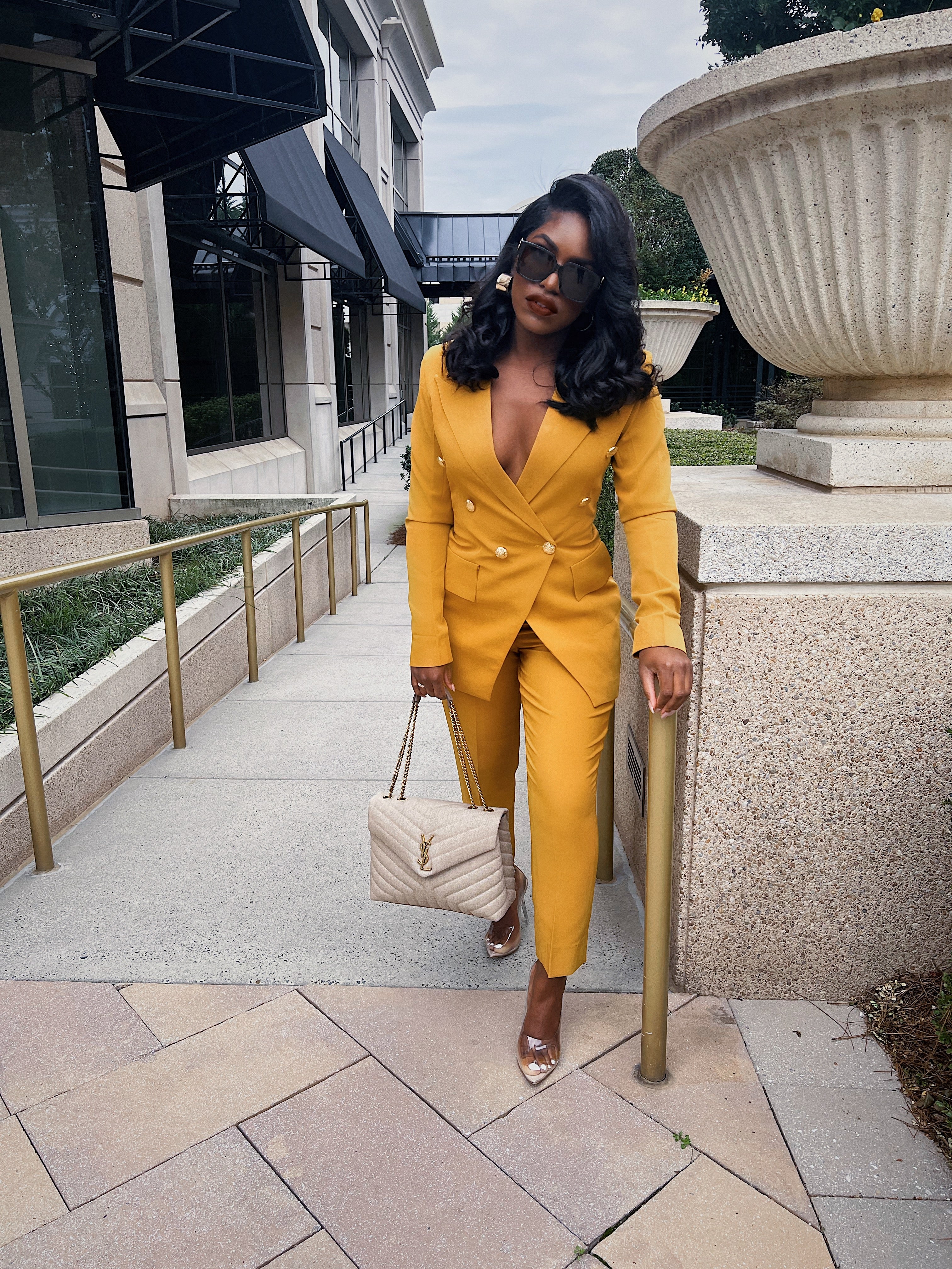 Elegant looking mustard suit set with double-breasted blazer, gold-detailed buttons and ankle-length pants.